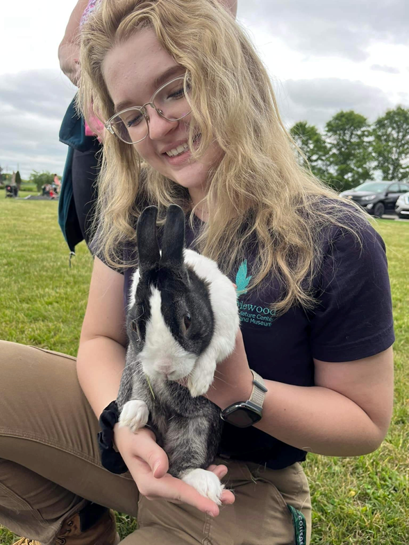 Headshot of Megan Walters holding a rabbit.