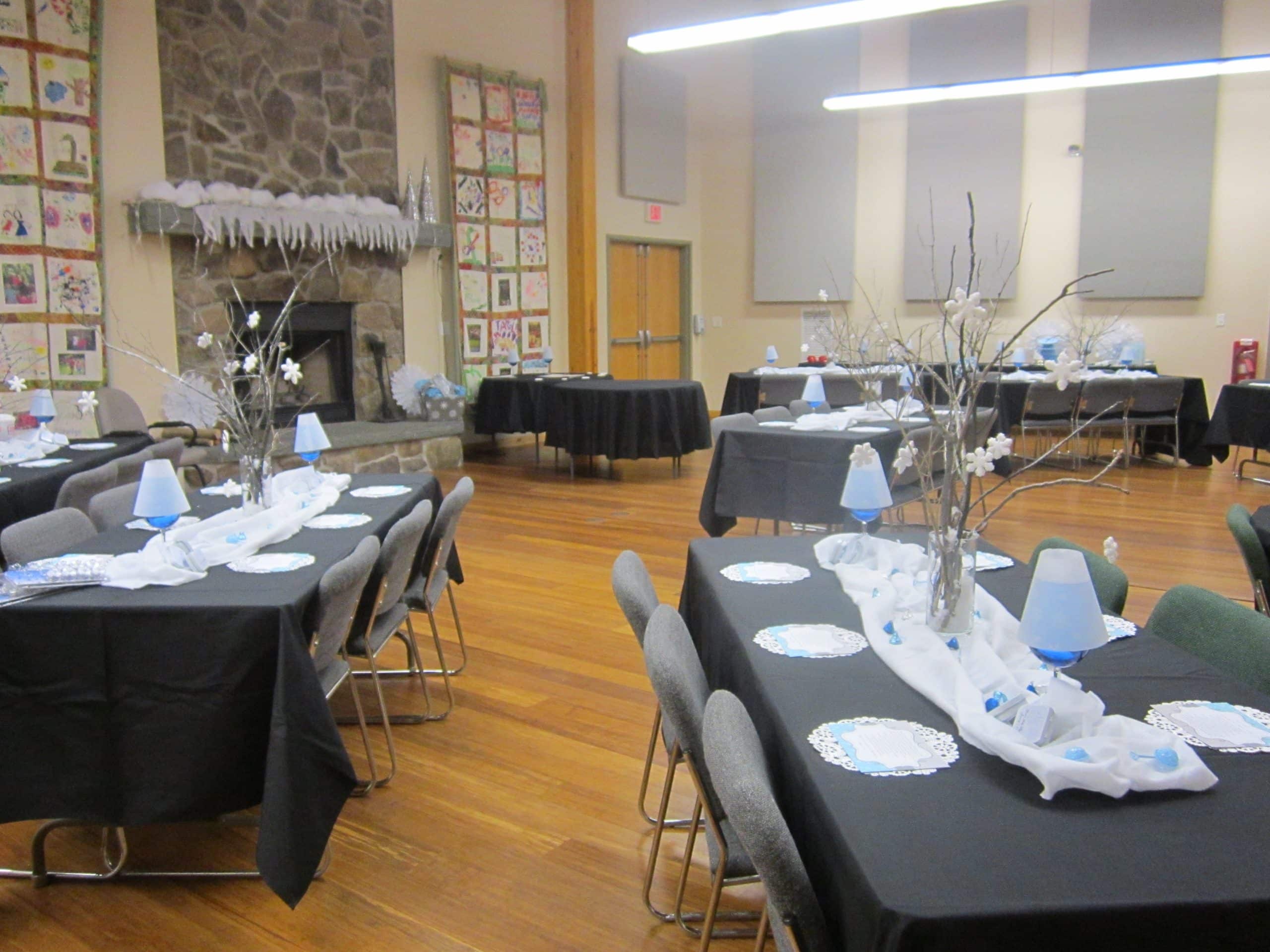 Inside of auditorium decorated for a party.